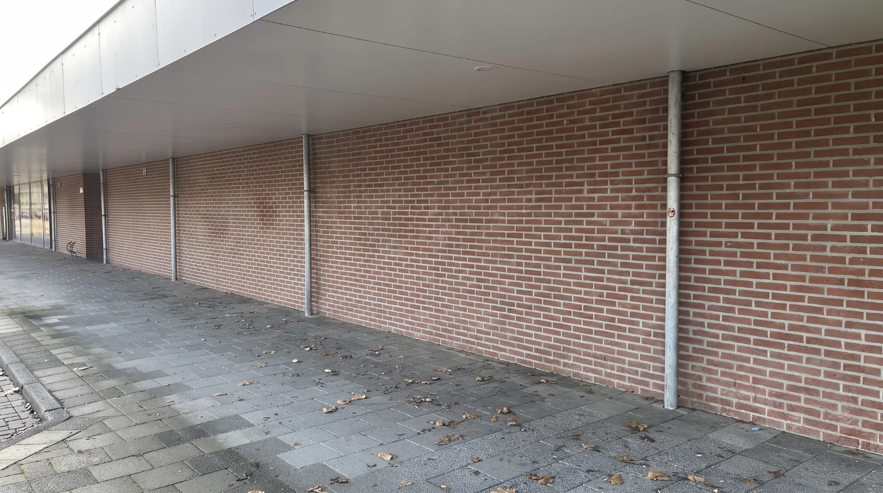 The brick wall where the videostore once stood